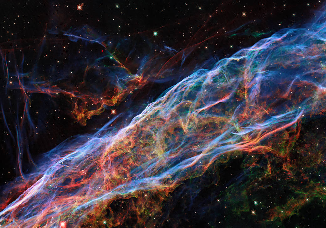 哈勃太空望远镜拍摄的面纱星云的特写图像。请参阅说明。