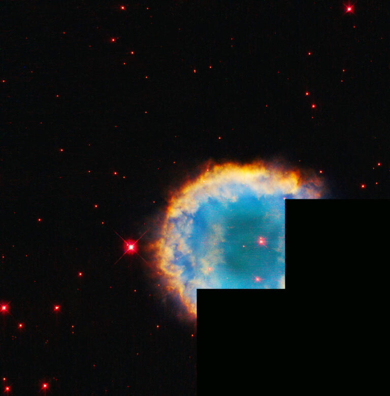 哈勃拍摄到被朦胧光环环绕的彩色行星星云