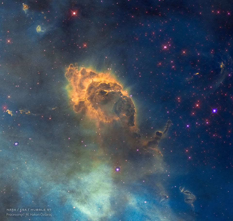 特色图像显示了哈勃太空望远镜拍摄的船底座星云中的尘埃柱HH 666。有关更多详细信息，请参阅说明。
