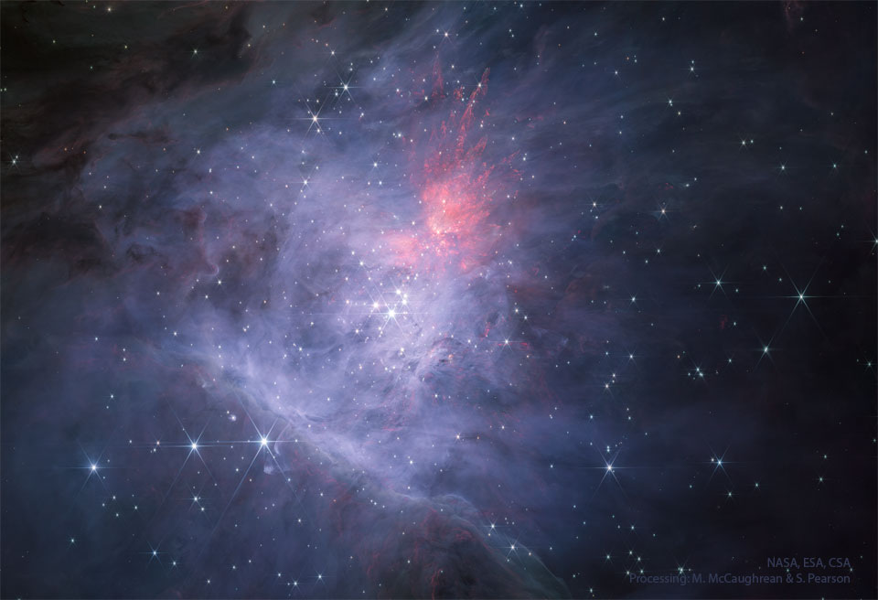 詹姆斯·韦伯太空望远镜拍摄的红外光下的猎户座大星云中心。中间是四边形星团。主图像为近红外光之代表色影像，轮转图像为中红外光之代表色影像。有关更多详细信息，请参阅说明。